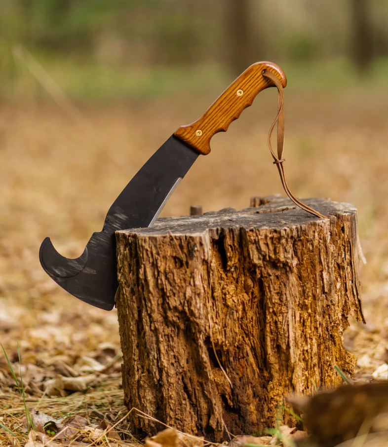  A Woodman’s Pal machete lodged in a tree stump. 