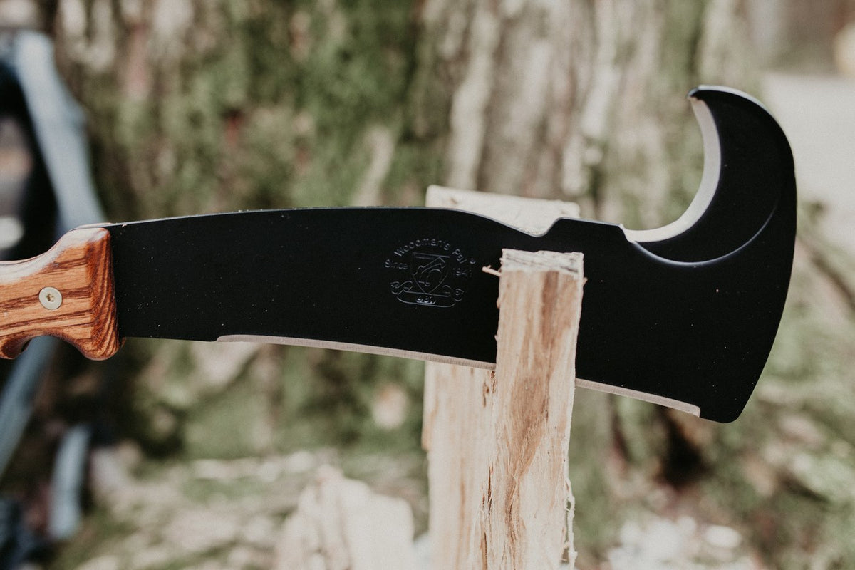 Splitting a log with the wood-handle Woodman's Pal