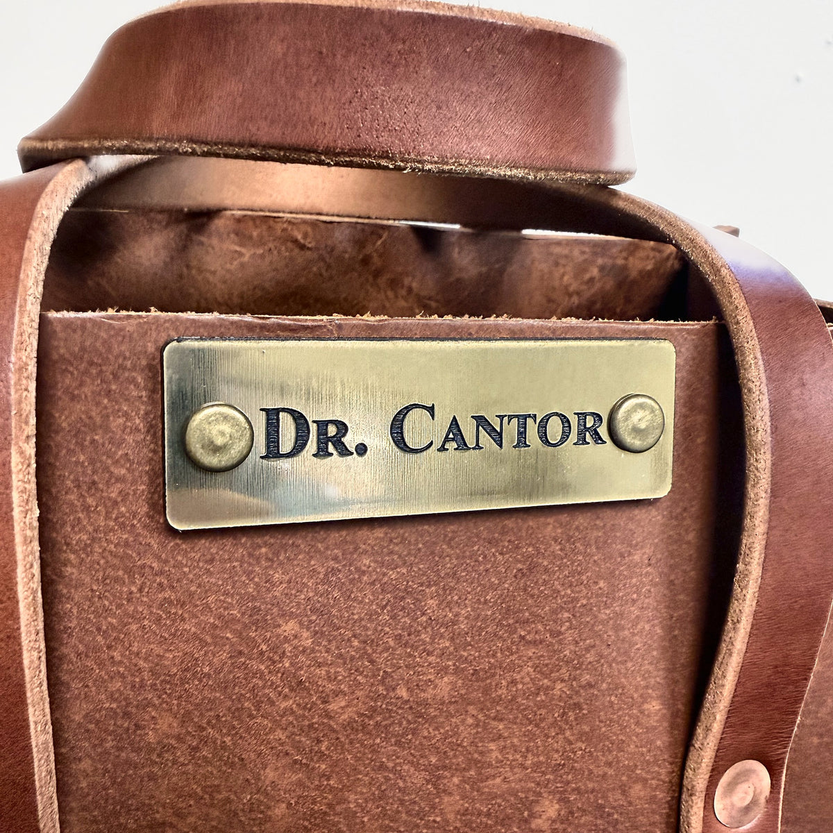 Example of optional engraved brass name plate on Woodman's Pal leather tool bag (2 of 3)