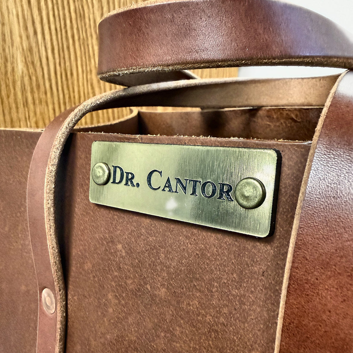 Example of optional engraved brass name plate on Woodman's Pal leather tool bag (3 of 3)