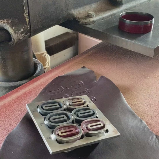 Video: leather washers for the Woodman's Pal #284 leather handle being die-cut from a leather hide on a press