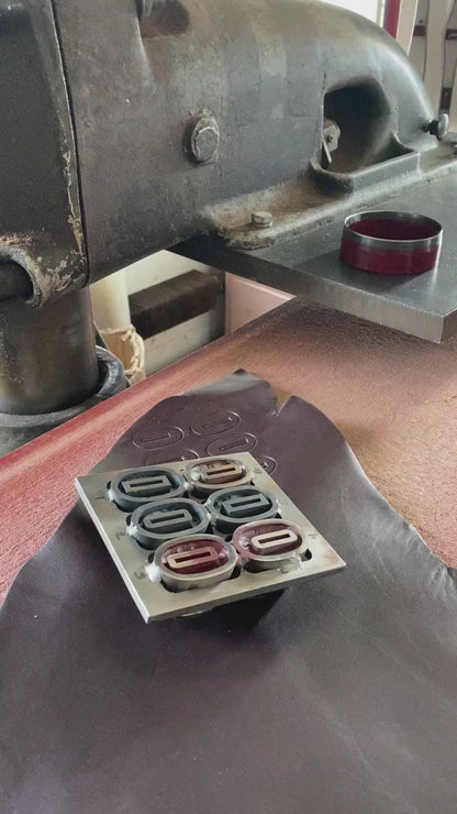 Video: leather washers for the Woodman's Pal #284 leather handle being die-cut from a leather hide on a press
