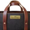 Black leather bag with engraved plaque